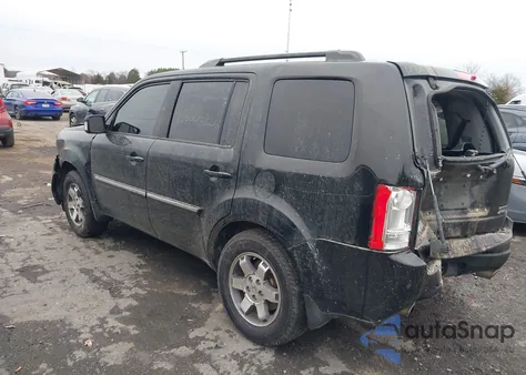 2011 Honda Pilot Touring z USA, uszkodzony, nr VIN 5FNYF4H98BB091907